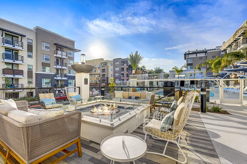 Cozy fire pit area at Jefferson Platinum Triangle Apartments in Anaheim offering luxury outdoor entertainment spaces