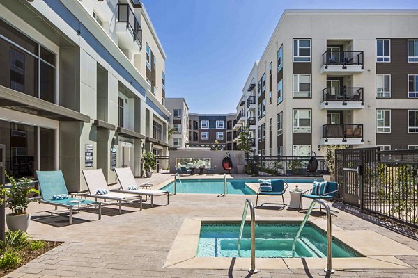 hot tub/jacuzzi and pool at Jefferson Platinum Triangle Apartments
