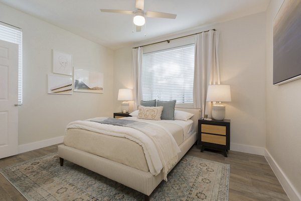 Elegant bedroom with contemporary furnishings at Cantera Apartments, a Greystar luxury property