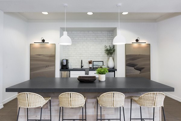 Clubhouse with modern design and seating at Cantera Apartments