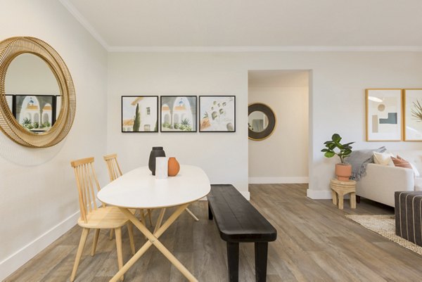 Dining area featuring stylish modern furnishings at Cantera Apartments