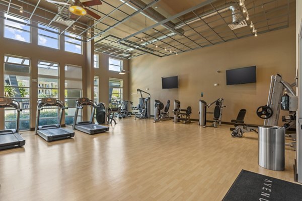 State-of-the-art fitness center with modern equipment at Avenue 900 Apartments, perfect for active residents seeking luxury living