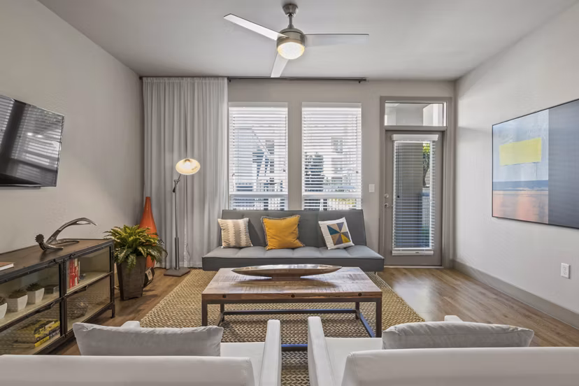 Spacious living room with modern dÃ©cor in Avenue 900 Apartments for luxury living