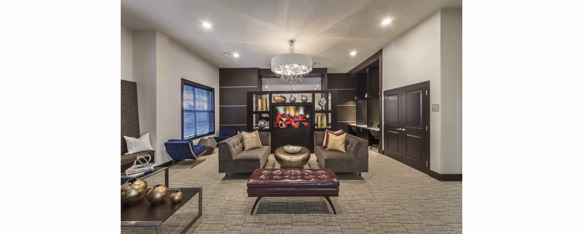 Clubhouse with contemporary design and cozy seating areas at 221 Bergen Apartments