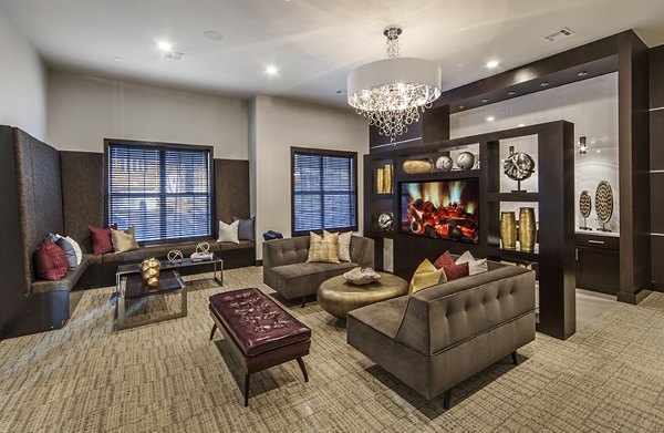 Modern clubhouse with cozy seating and communal spaces at 221 Bergen Apartments, enhancing social living experiences
