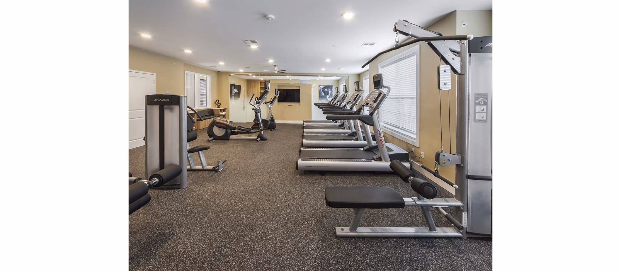 Modern fitness center with state-of-the-art equipment at 221 Bergen Apartments in Greystar community