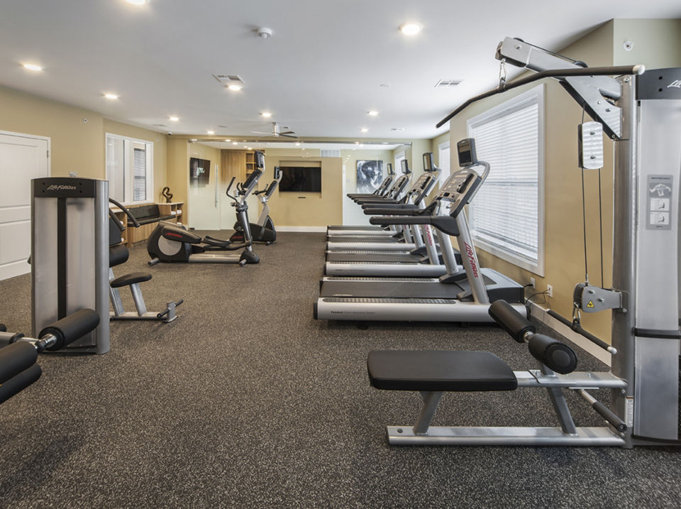 Modern fitness center with state-of-the-art equipment at 221 Bergen Apartments in Greystar community