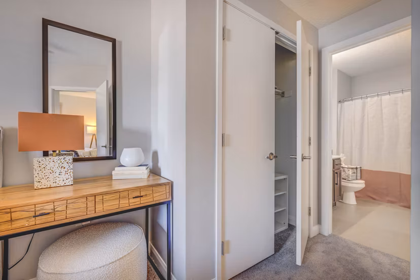 Modern bedroom with elegant decor at The Essex Apartments offering luxury living features