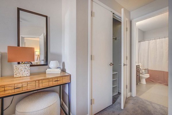 Modern bedroom with elegant decor at The Essex Apartments offering luxury living features