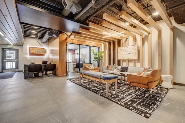Clubhouse featuring modern interiors and recreational spaces at The Essex Apartments