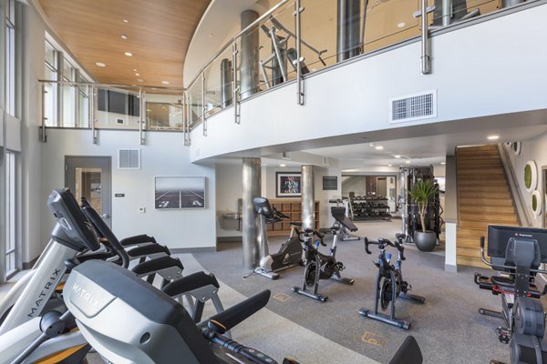 State-of-the-art fitness room with modern equipment at The Standard Apartments