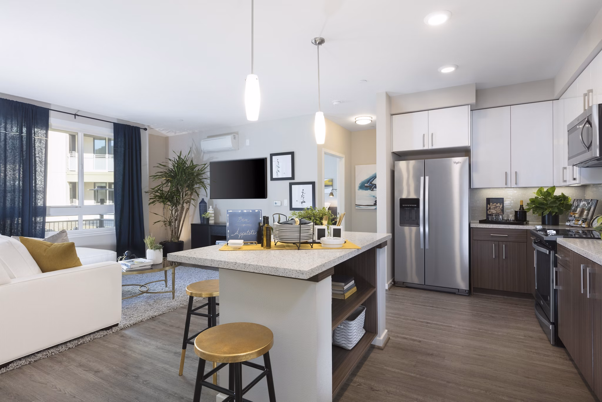 Modern kitchen with stainless steel appliances at The Standard luxury apartments