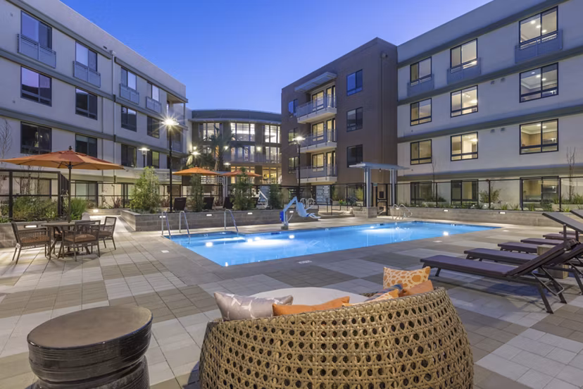 Resort-style pool at The Standard Apartments offering luxury outdoor relaxation