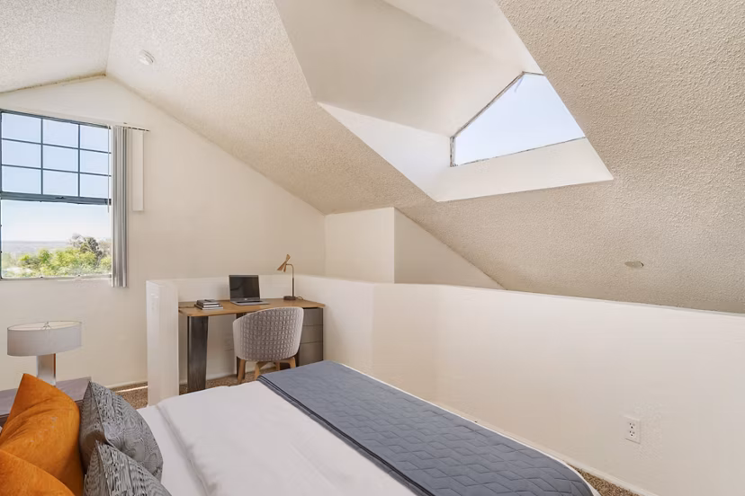 Spacious bedroom with modern decor at Union 505 Apartments