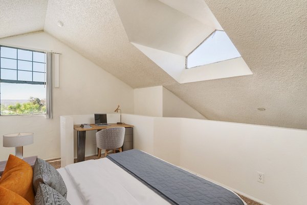 Spacious bedroom with modern decor at Union 505 Apartments