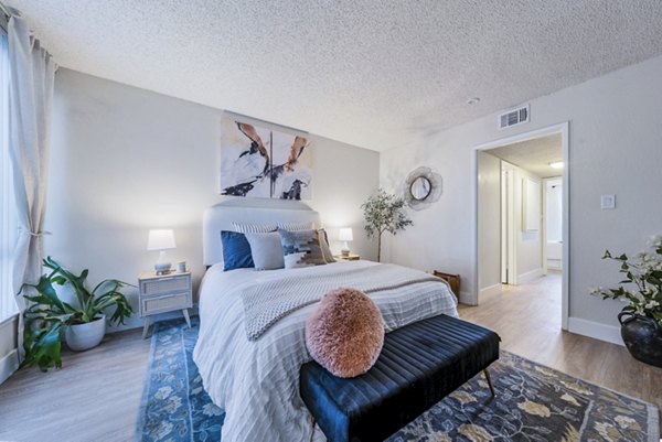 Spacious bedroom with modern decor at Harbor Park Apartments, luxury living by Greystar
