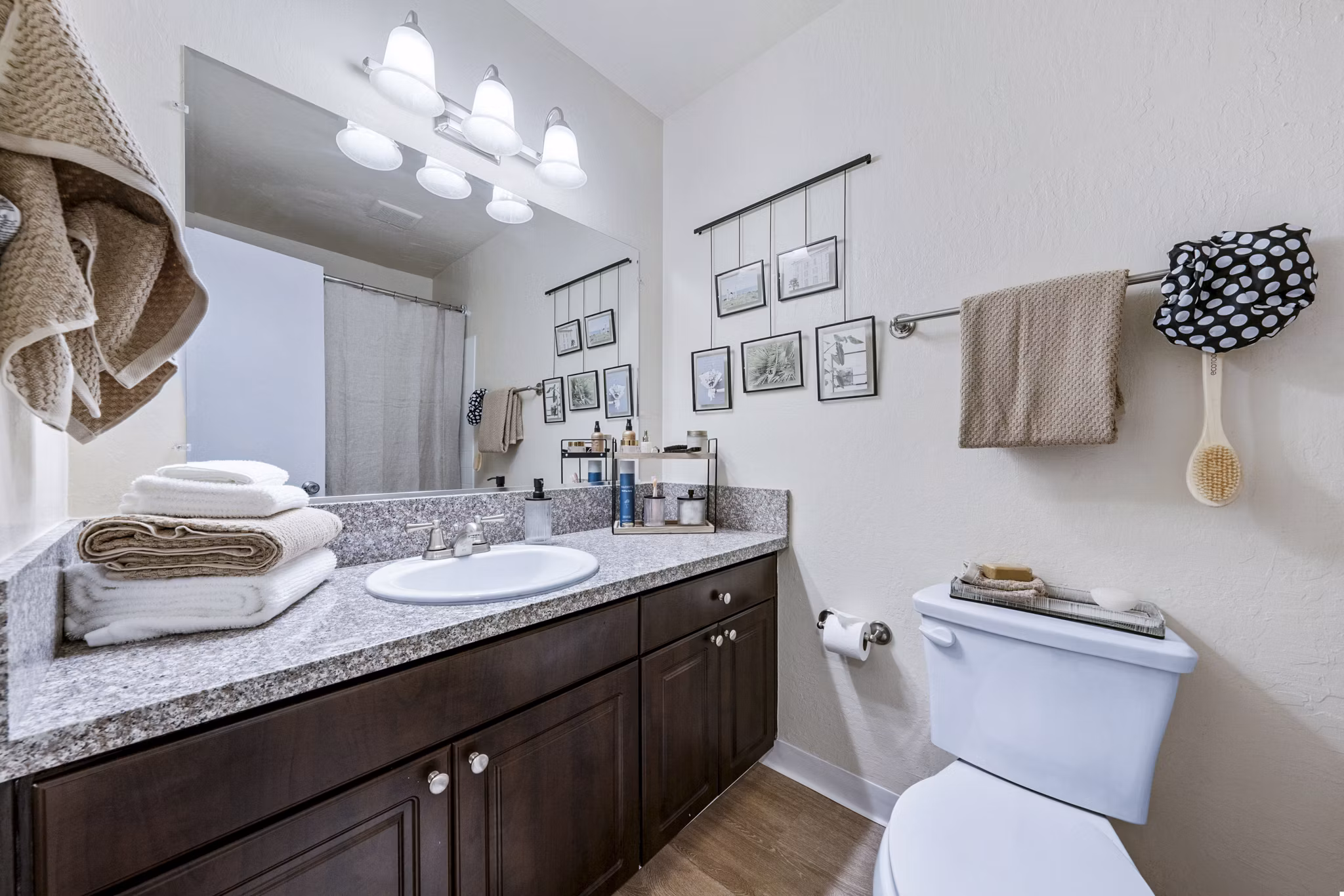 Luxurious bathroom with modern fixtures in Harbor Park Apartments