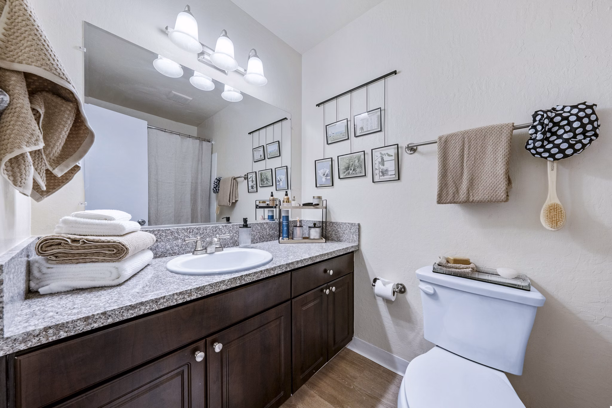Luxurious bathroom with modern fixtures in Harbor Park Apartments