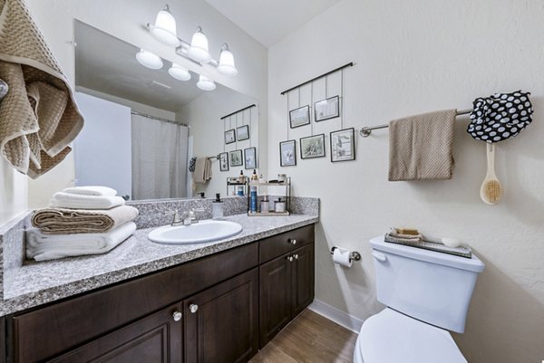 Luxurious bathroom with modern fixtures in Harbor Park Apartments
