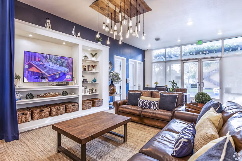 Elegant clubhouse lobby with modern decor in Harbor Park Apartments, offering luxury living spaces in a vibrant community
