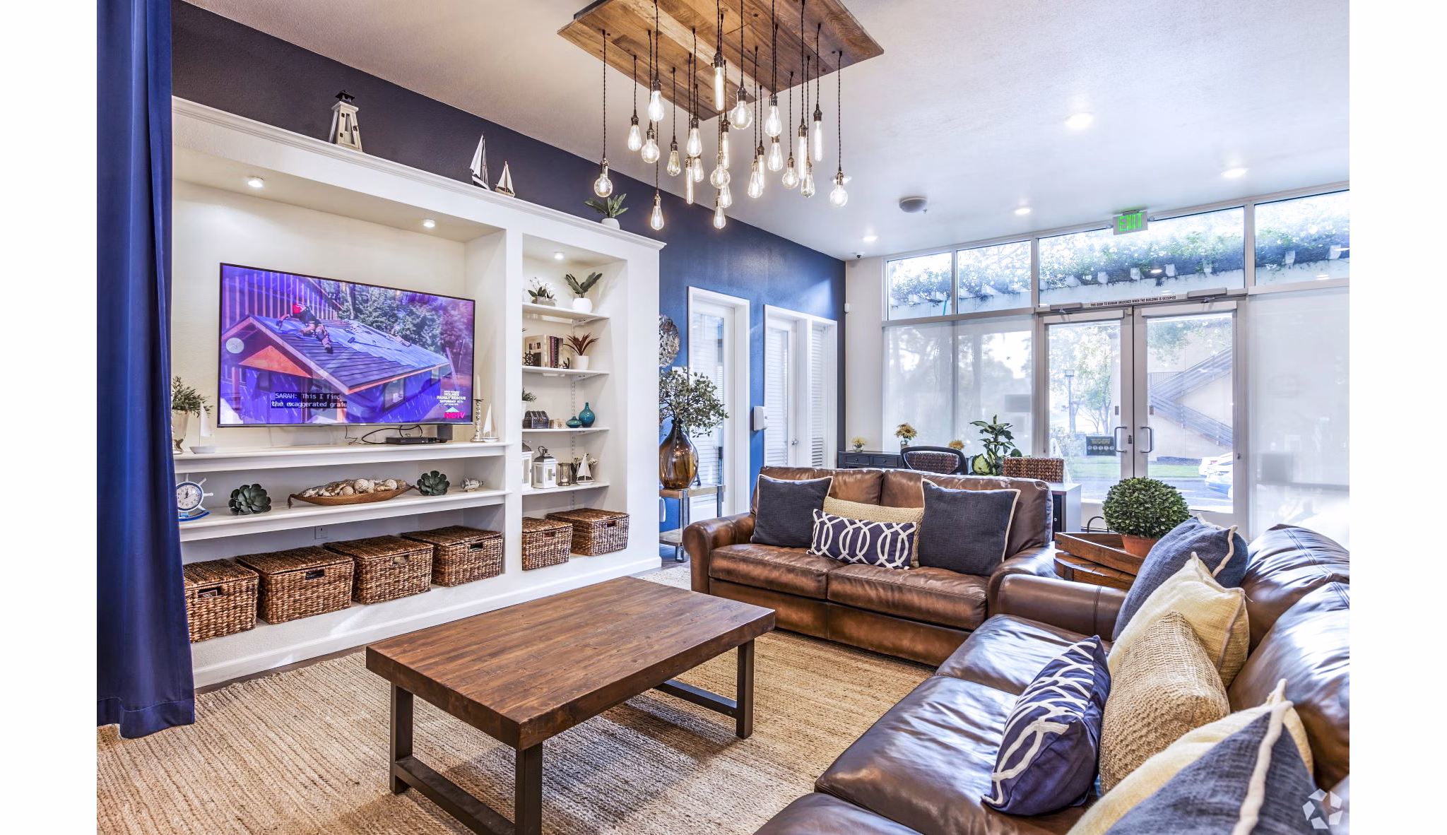 Elegant clubhouse lobby with modern decor in Harbor Park Apartments, offering luxury living spaces in a vibrant community