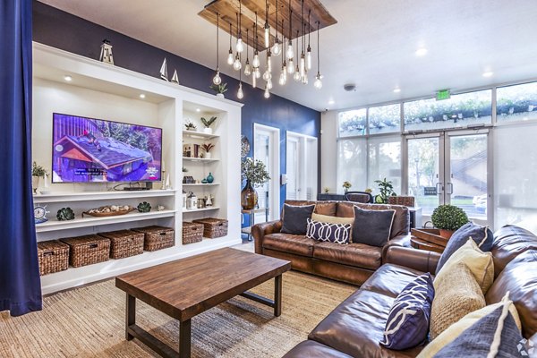 Elegant clubhouse lobby with modern decor in Harbor Park Apartments, offering luxury living spaces in a vibrant community