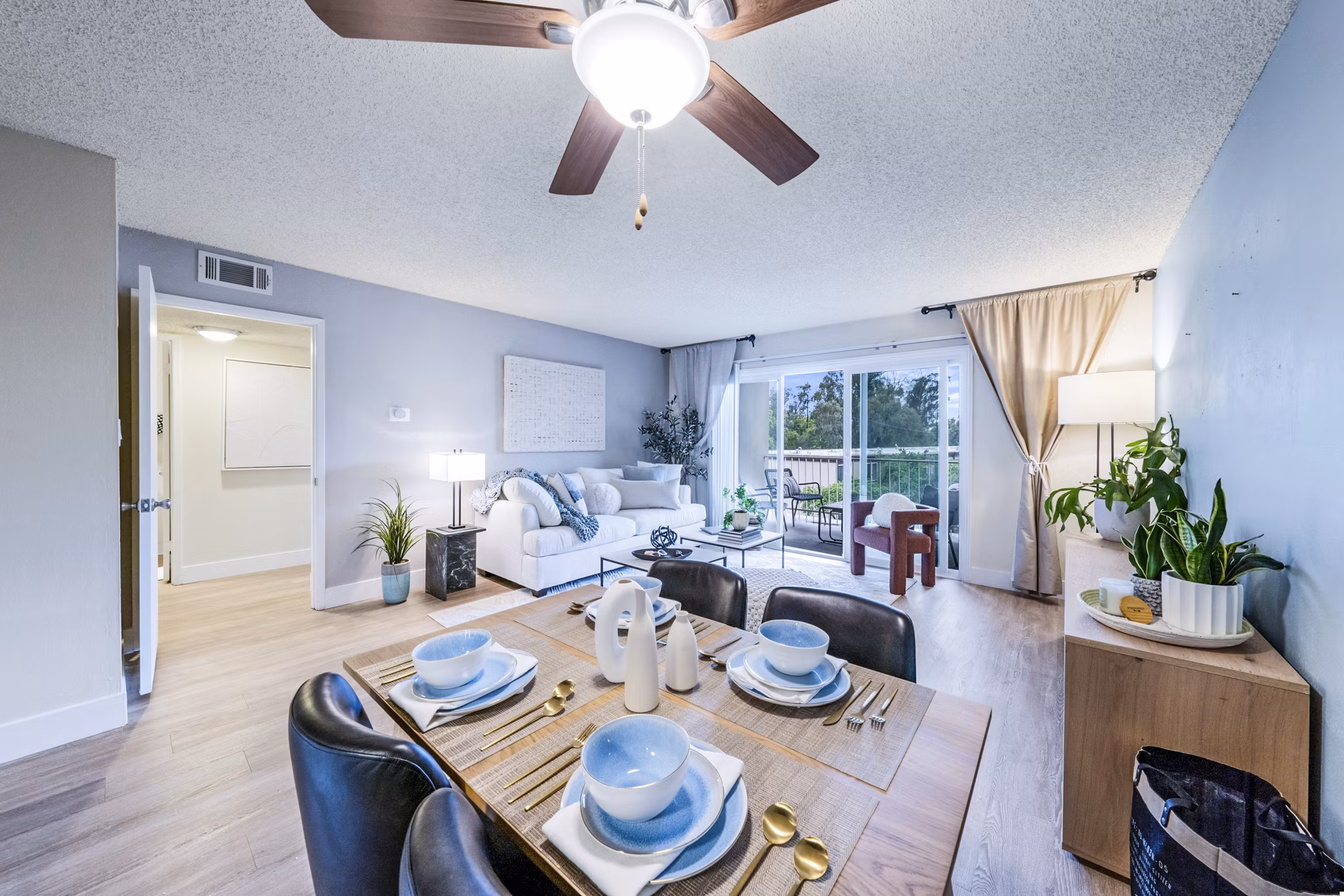 Dining room with elegant lighting and stylish decor at Harbor Park Apartments, Greystar luxury apartments, perfect for modern living