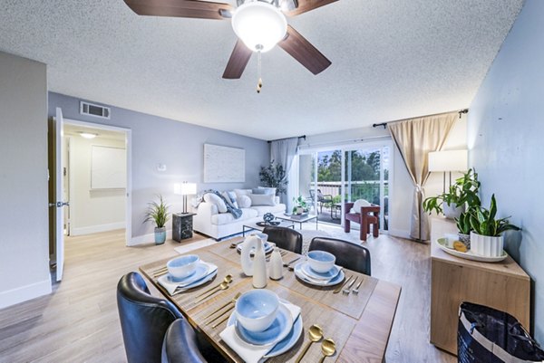 Dining room with elegant lighting and stylish decor at Harbor Park Apartments, Greystar luxury apartments, perfect for modern living