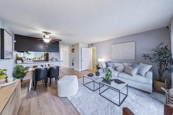 Cozy living room with modern furnishings at Harbor Park Apartments offering luxury living in a waterfront setting