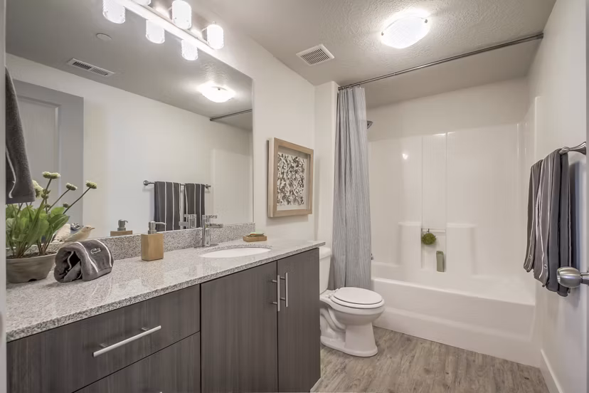 Modern bathroom with sleek fixtures at One West Apartments