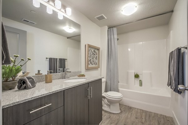 Modern bathroom with sleek fixtures at One West Apartments