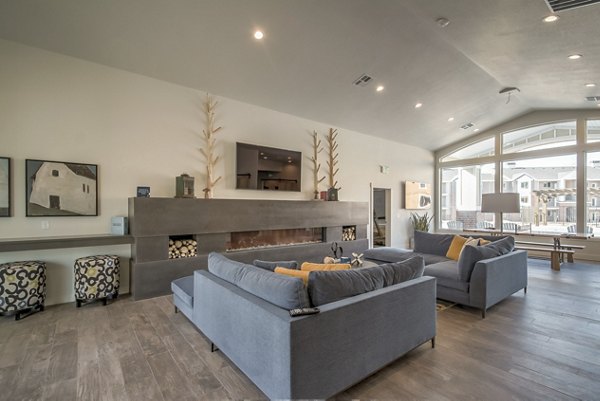 Clubhouse featuring modern design and cozy seating at One West Apartments in a luxury Greystar community