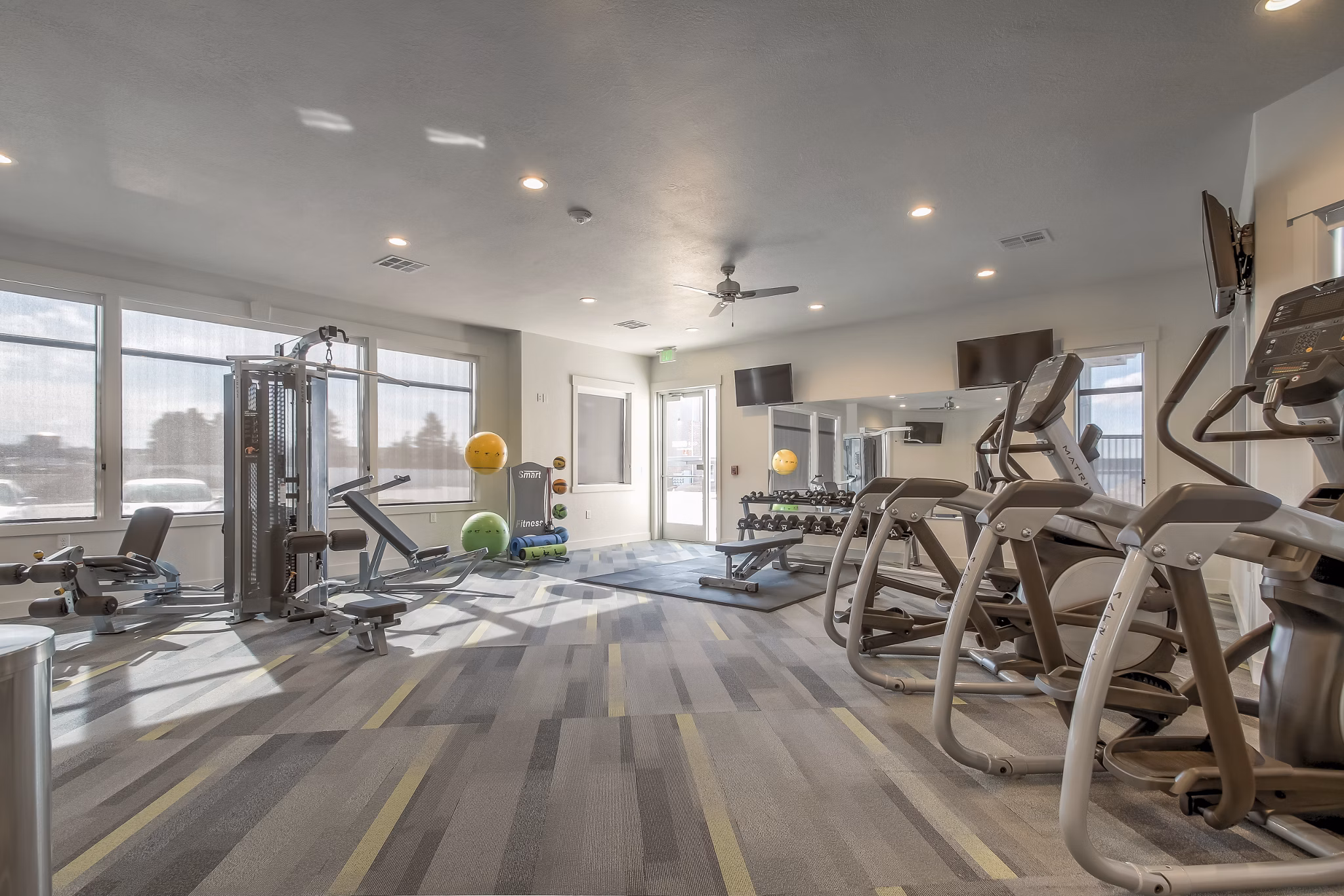 Fitness center with state-of-the-art equipment at One West Apartments offering luxurious living experiences