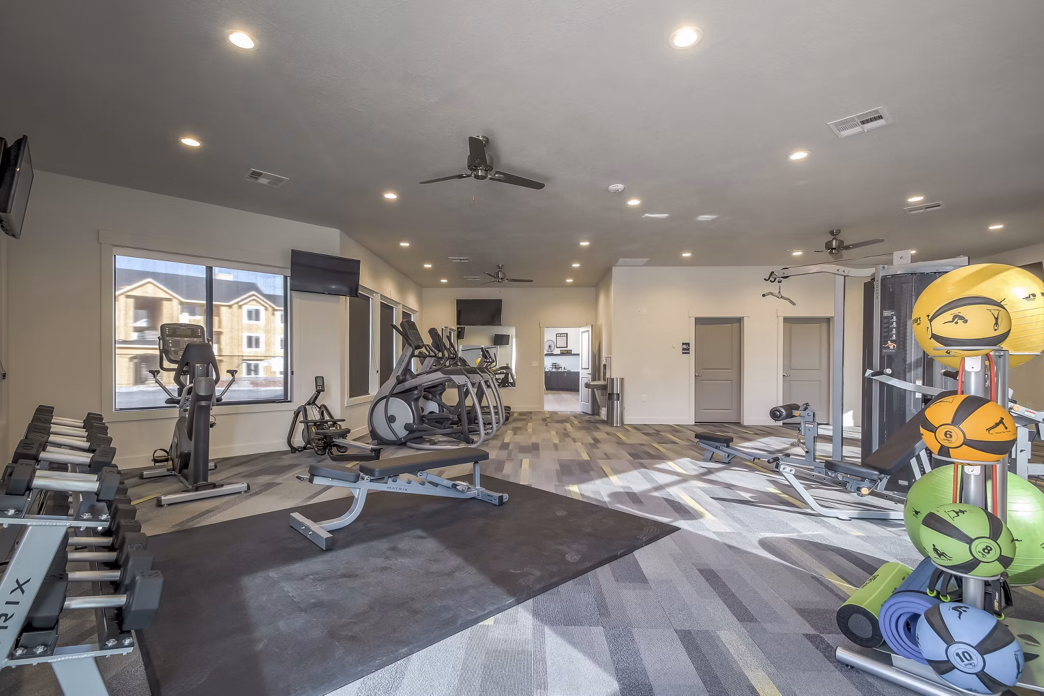 State-of-the-art fitness center with modern equipment at One West Apartments, perfect for staying active and healthy