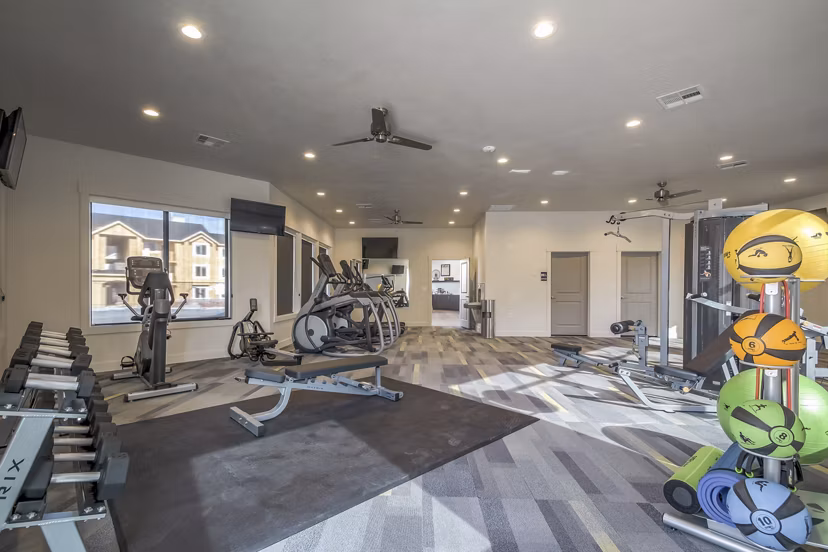 State-of-the-art fitness center with modern equipment at One West Apartments, perfect for staying active and healthy