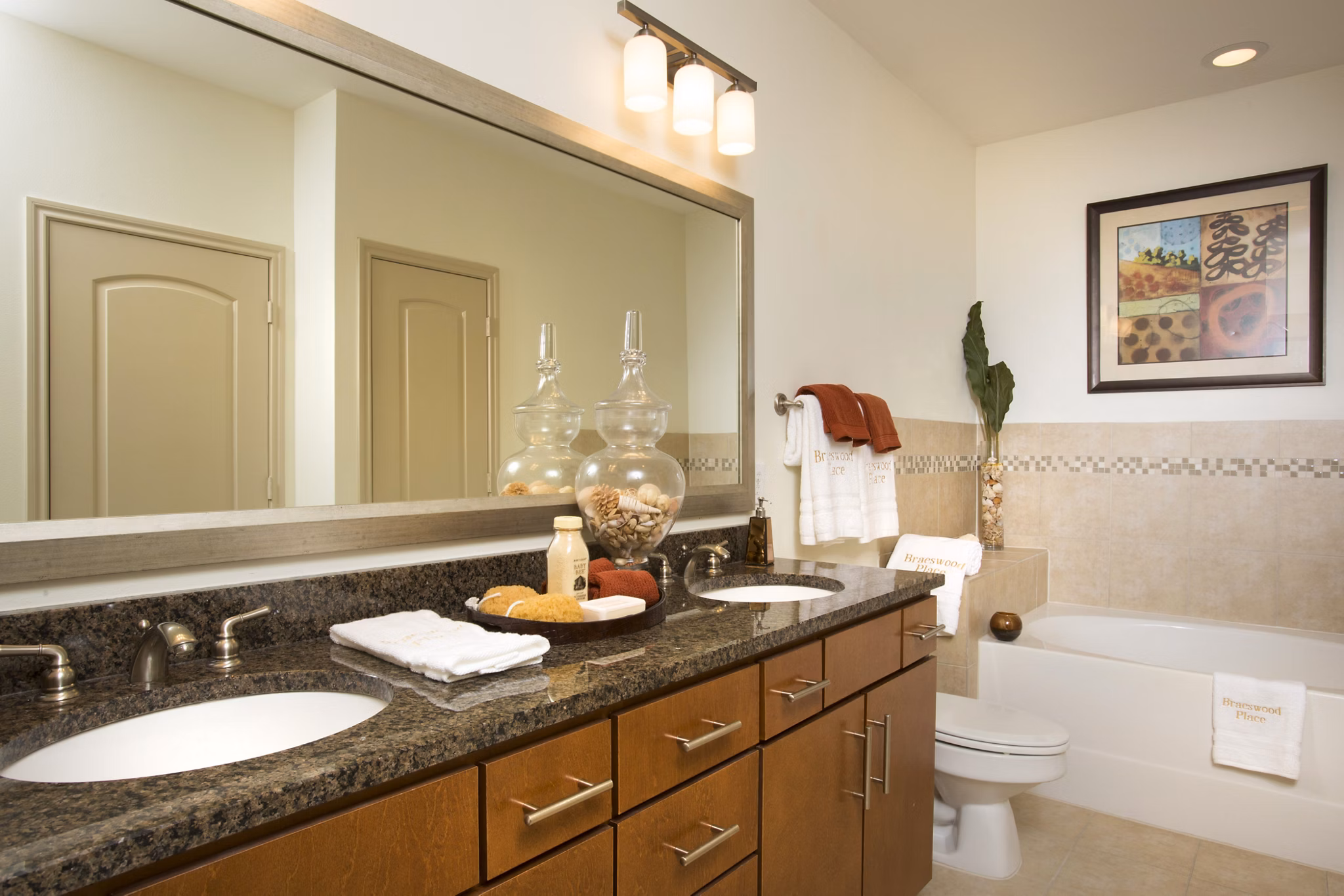 Spacious bathroom with modern fixtures in Braeswood Place Apartments