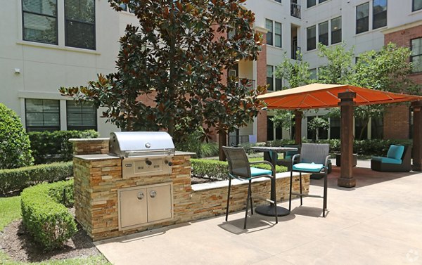 grill area at Braeswood Place Apartments