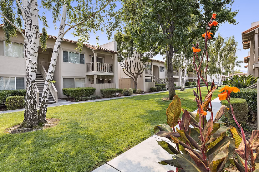 Classic brick of The Franciscan Apartments: Luxury living in a serene neighborhood
