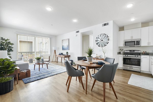 Dining area with modern furnishings and natural light at Blue Oak Apartments