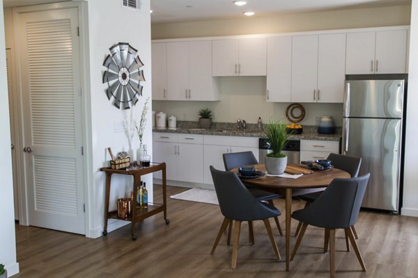 Dining area with modern furnishings at Blue Oak luxury apartments in the Greystar community