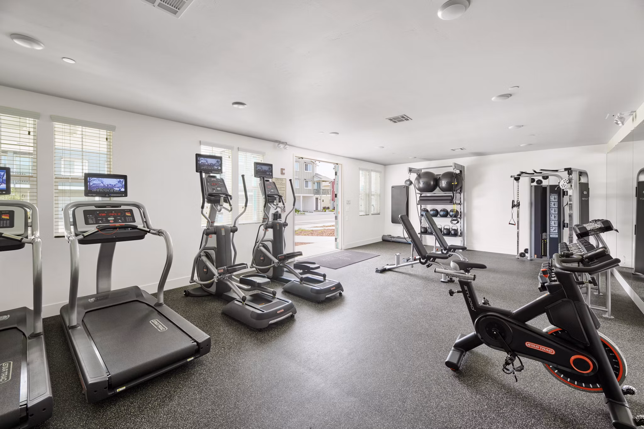 Modern fitness center with state-of-the-art equipment at Blue Oak Apartments, perfect for maintaining an active lifestyle