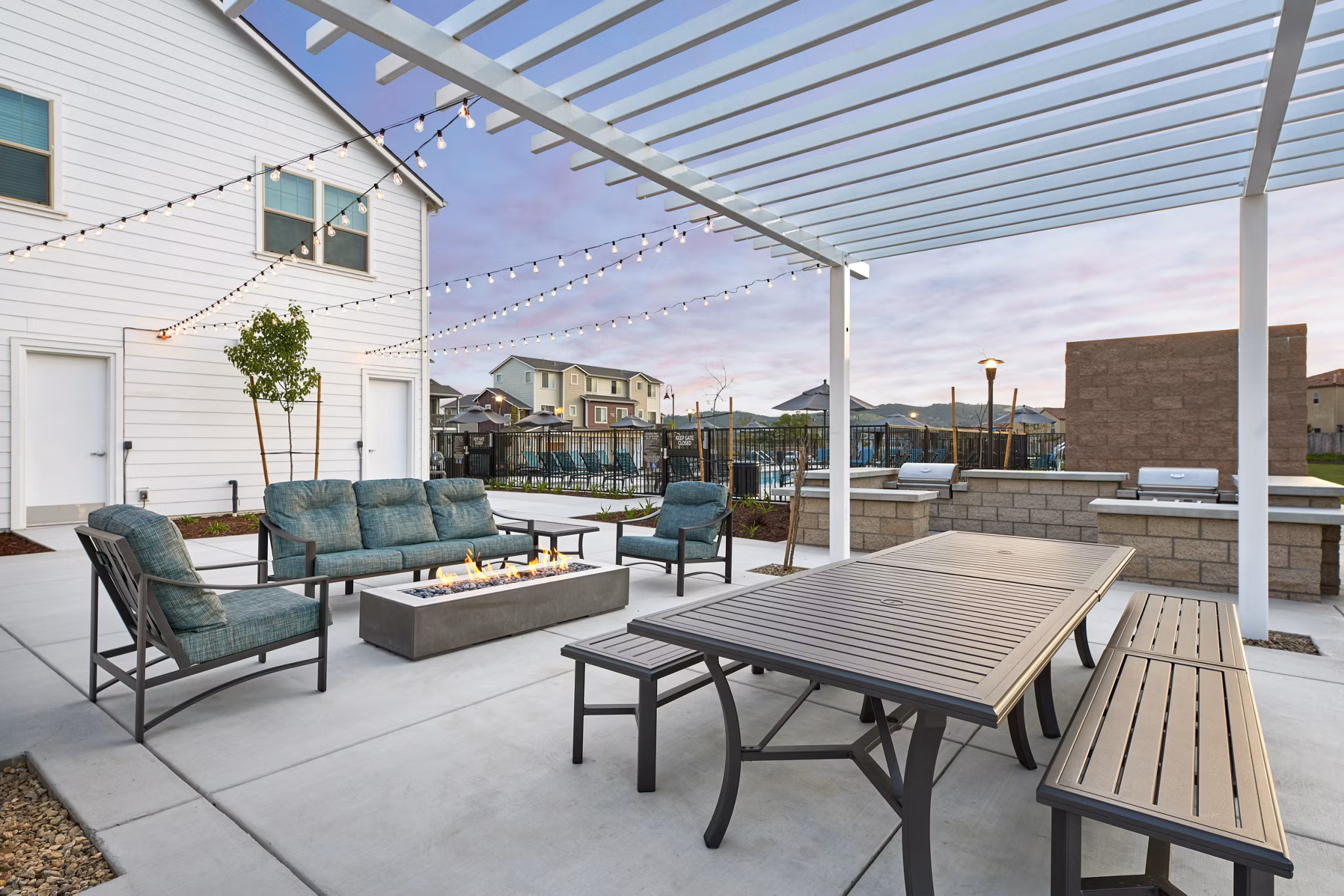 Fire pit with cozy seating at Blue Oak Apartments, perfect for outdoor gatherings and relaxation
