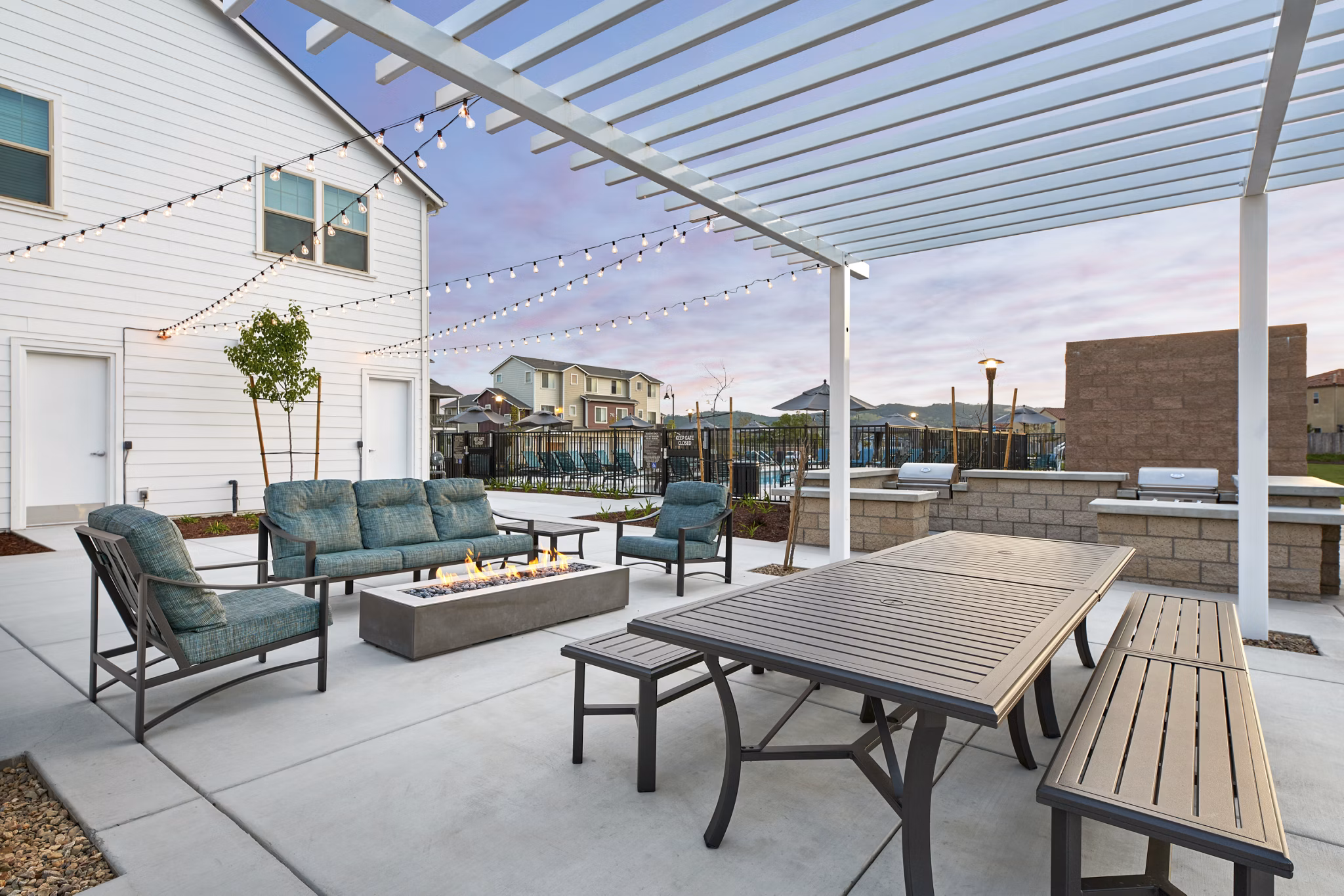 Fire pit with cozy seating at Blue Oak Apartments, perfect for outdoor gatherings and relaxation