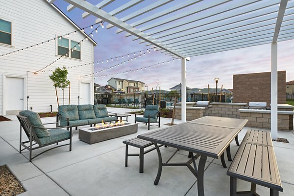 Fire pit with cozy seating at Blue Oak Apartments, perfect for outdoor gatherings and relaxation