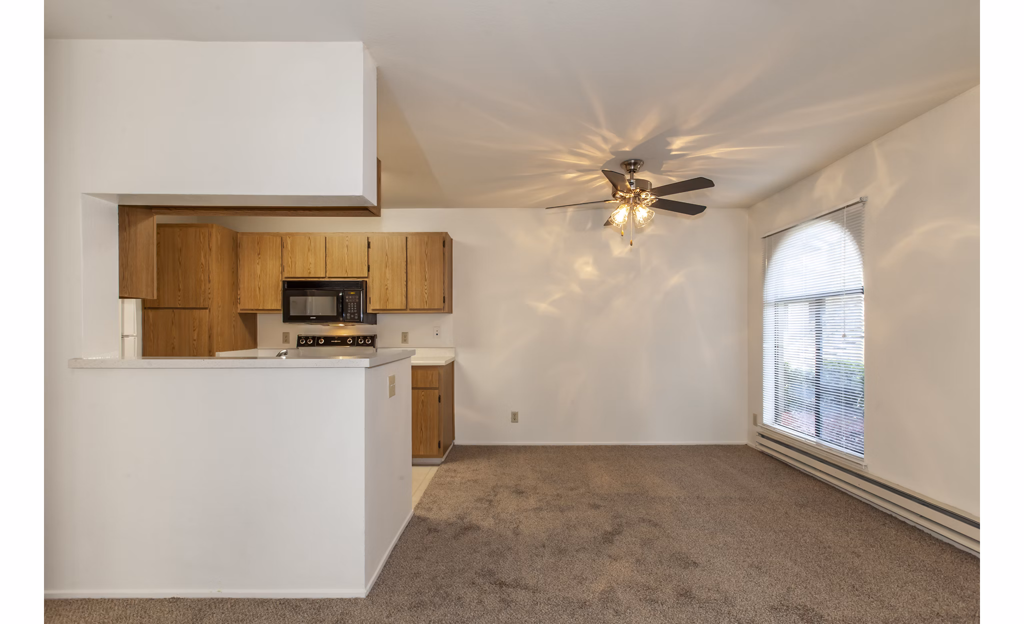Elegant dining room featuring modern decor and stylish lighting at Monte Vista Apartments