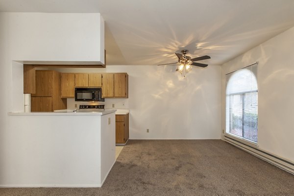 Elegant dining room featuring modern decor and stylish lighting at Monte Vista Apartments