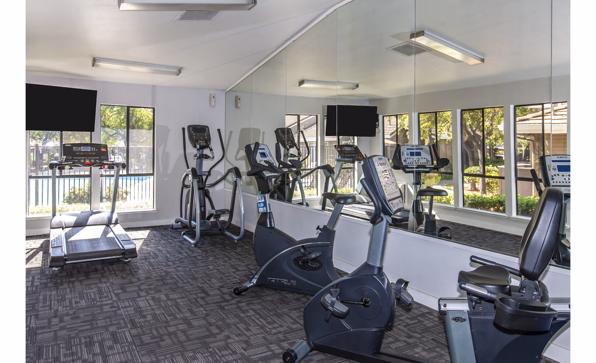 State-of-the-art fitness center featuring modern equipment at Monte Vista Apartments