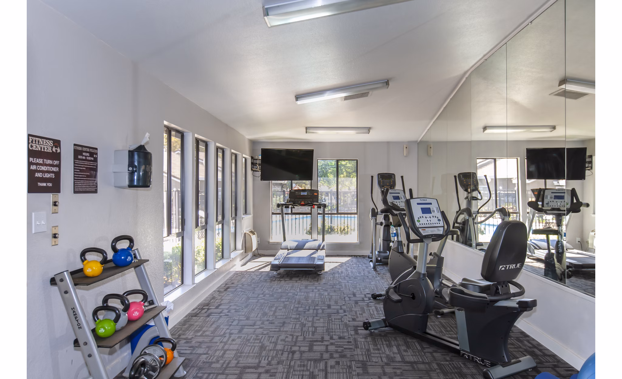 Modern fitness center with state-of-the-art equipment at Monte Vista Apartments