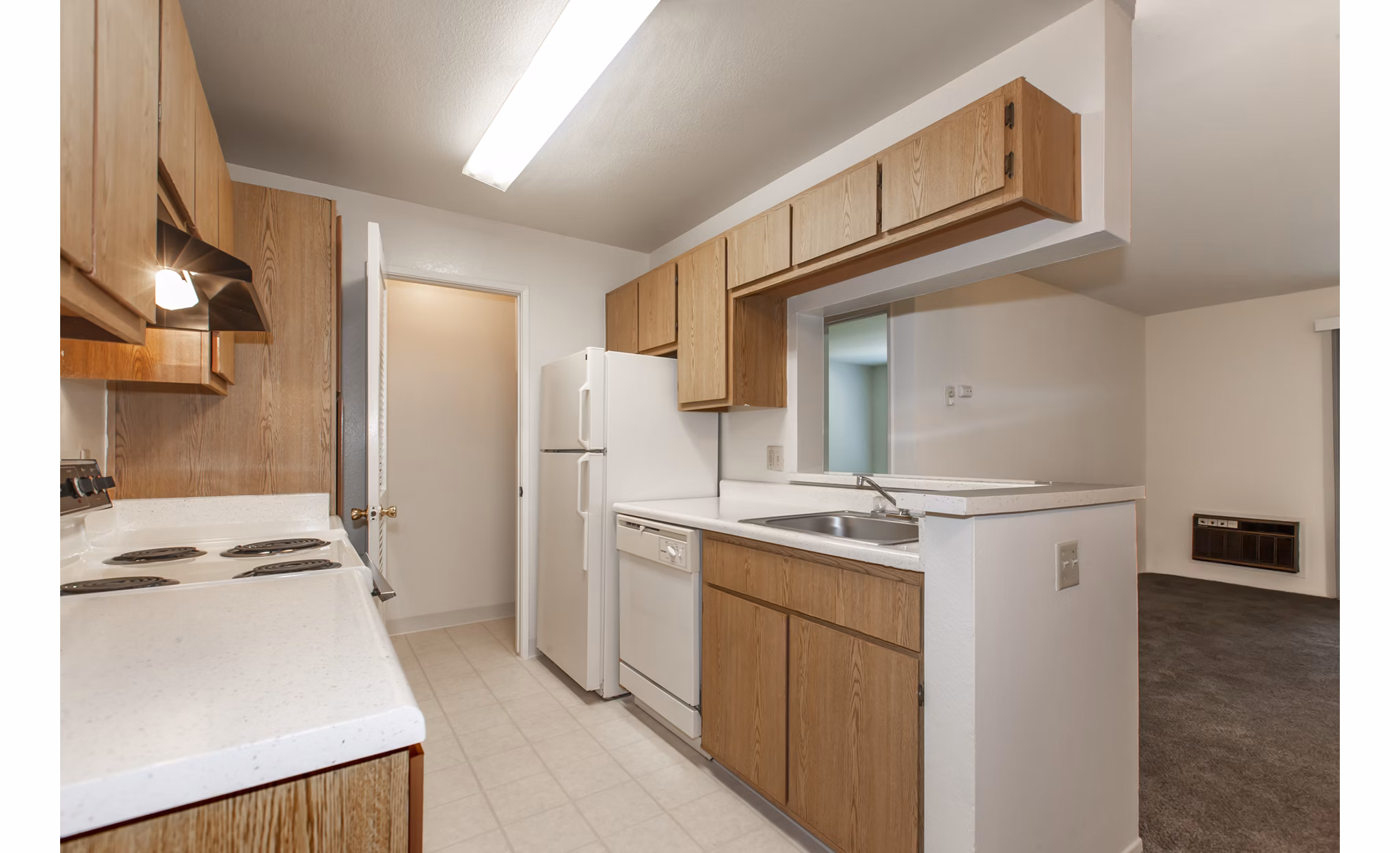 Monte Vista Apartments: Modern kitchen with stainless steel appliances and granite countertops