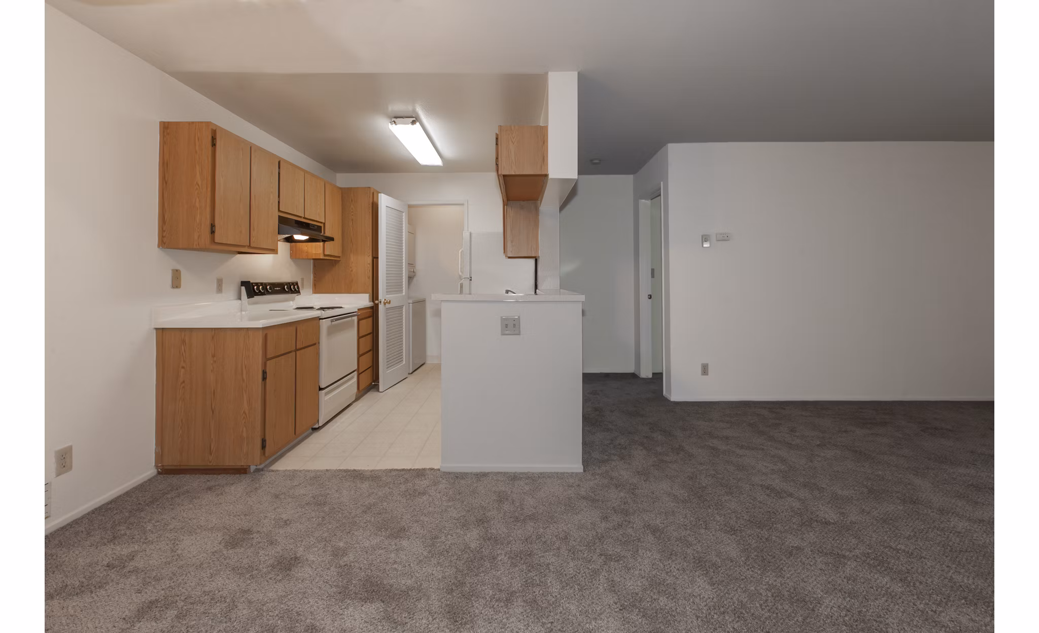 Modern kitchen with stainless steel appliances at Monte Vista Apartments